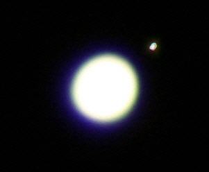 Jupiter mit einem seiner Monde: